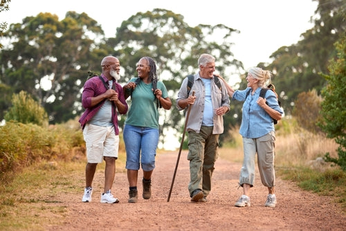 four people walking