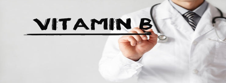 Doctor writing word Vitamin B with marker, Medical concept