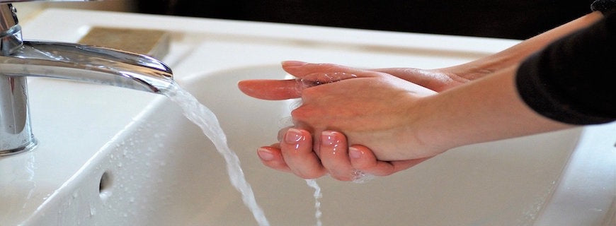 focus on hands washing at sink