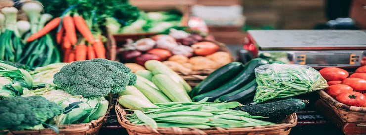 Image of various green vegetables arrayed on a table