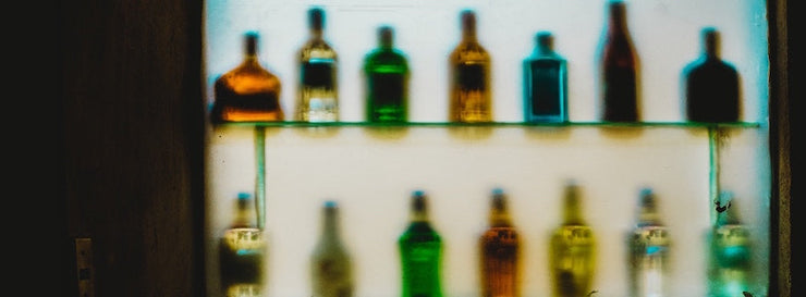 image of a distorted gantry of whisky bottles