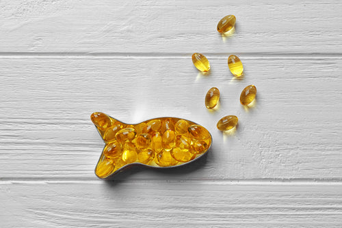 fish oil capsules in shape of a fish