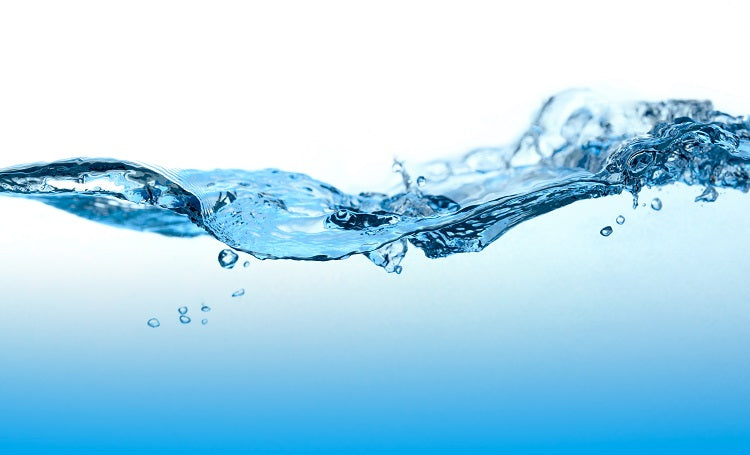 splash of water on blue background