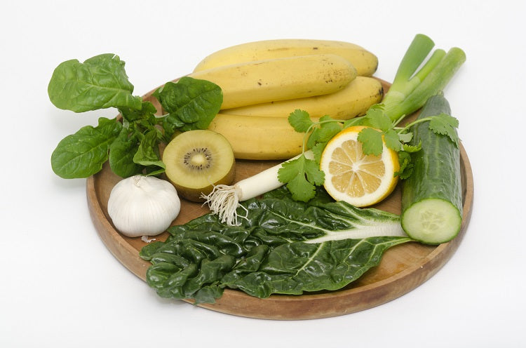 plate of raw fruit and vegetables