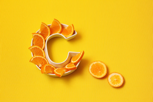 slices of oranges in a C shaped bowl